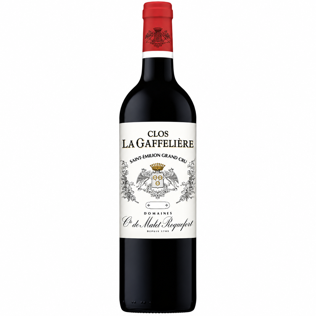 Glass of Clos La Gaffeliere red wine in a wine glass, showcasing deep ruby color and elegant presentation.