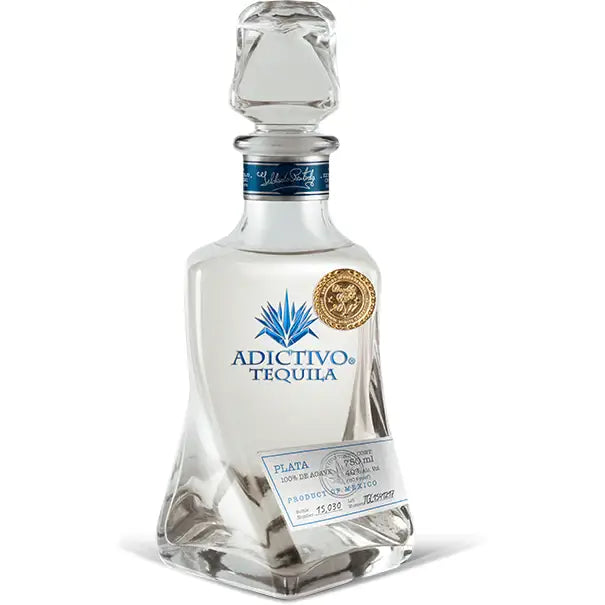 Buy Adictivo Blanco tequila, clear spirit in decorative glass bottle with blue label and gold seal