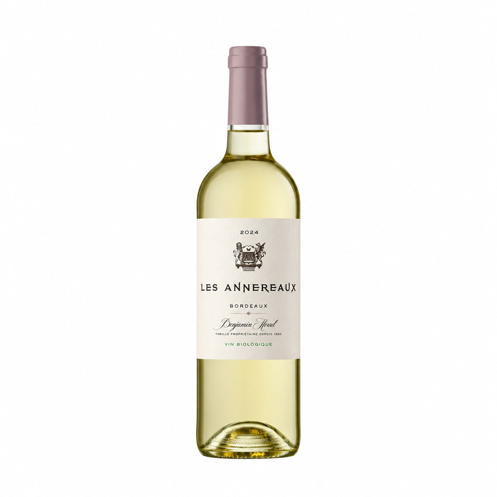 Chateau Les Annereaux Blanc wine bottle from Bordeaux, featuring a white label and elegant design, on a neutral background.