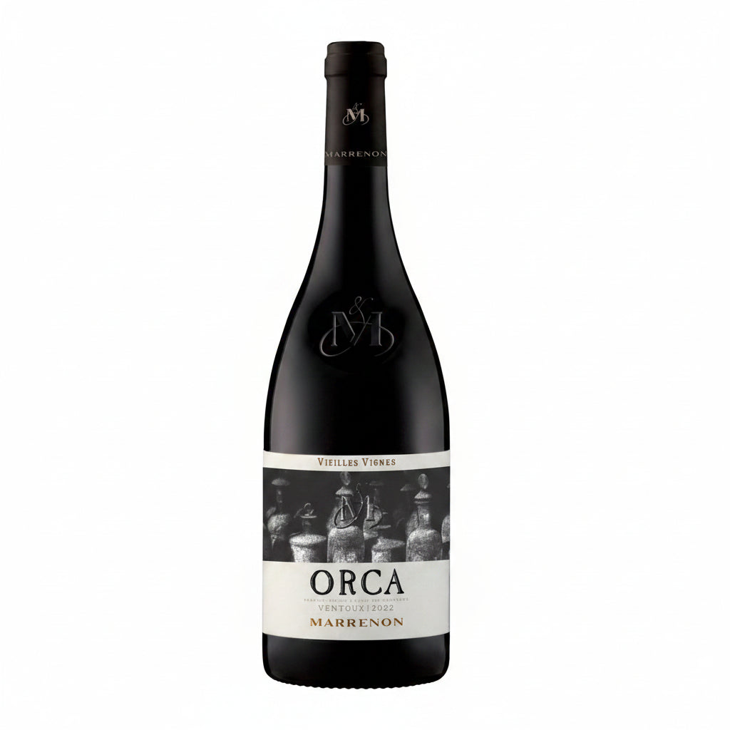Marrenon Orca wine bottle with dark label, standing upright on a wooden surface, showcasing the Marrenon Orca wine.