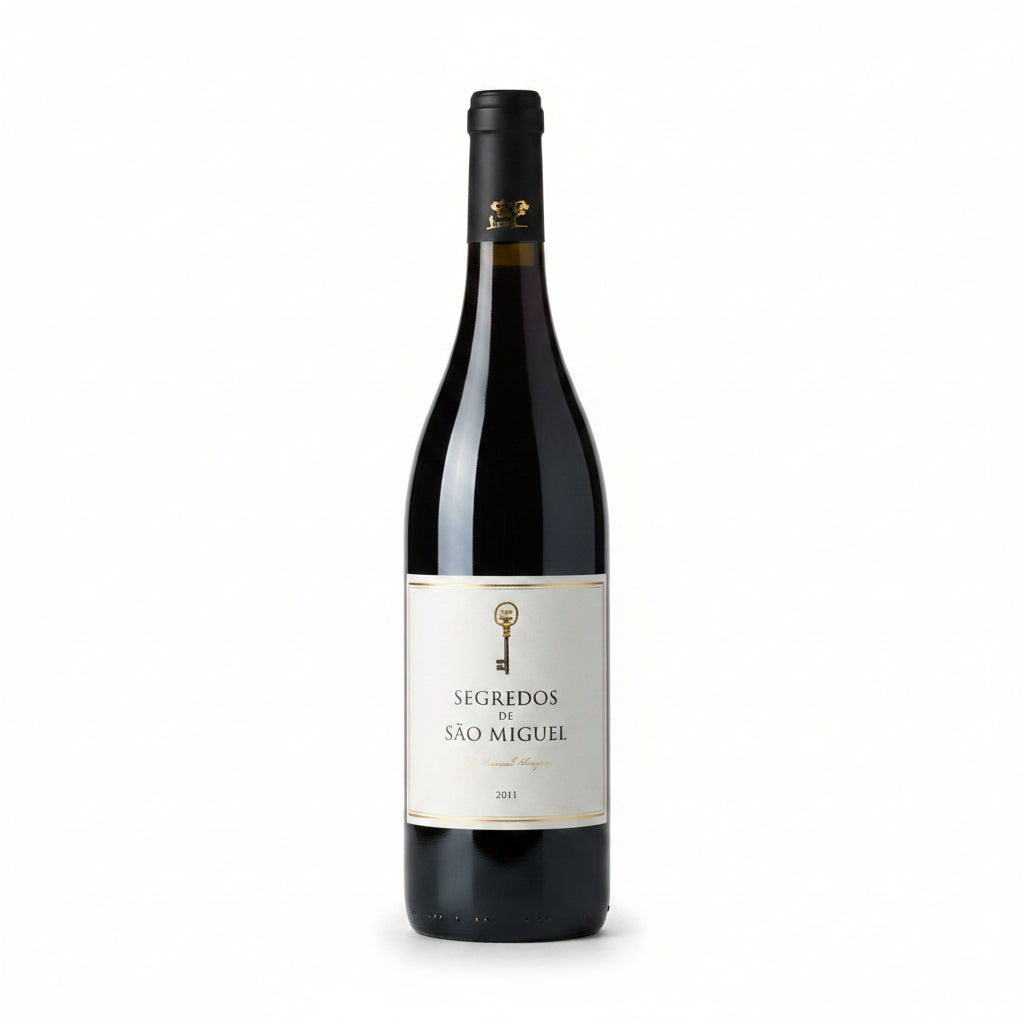 Bottle of Segredos De Sao Miguel Tinto red wine in a 750mL glass bottle with a dark label and cork stopper.