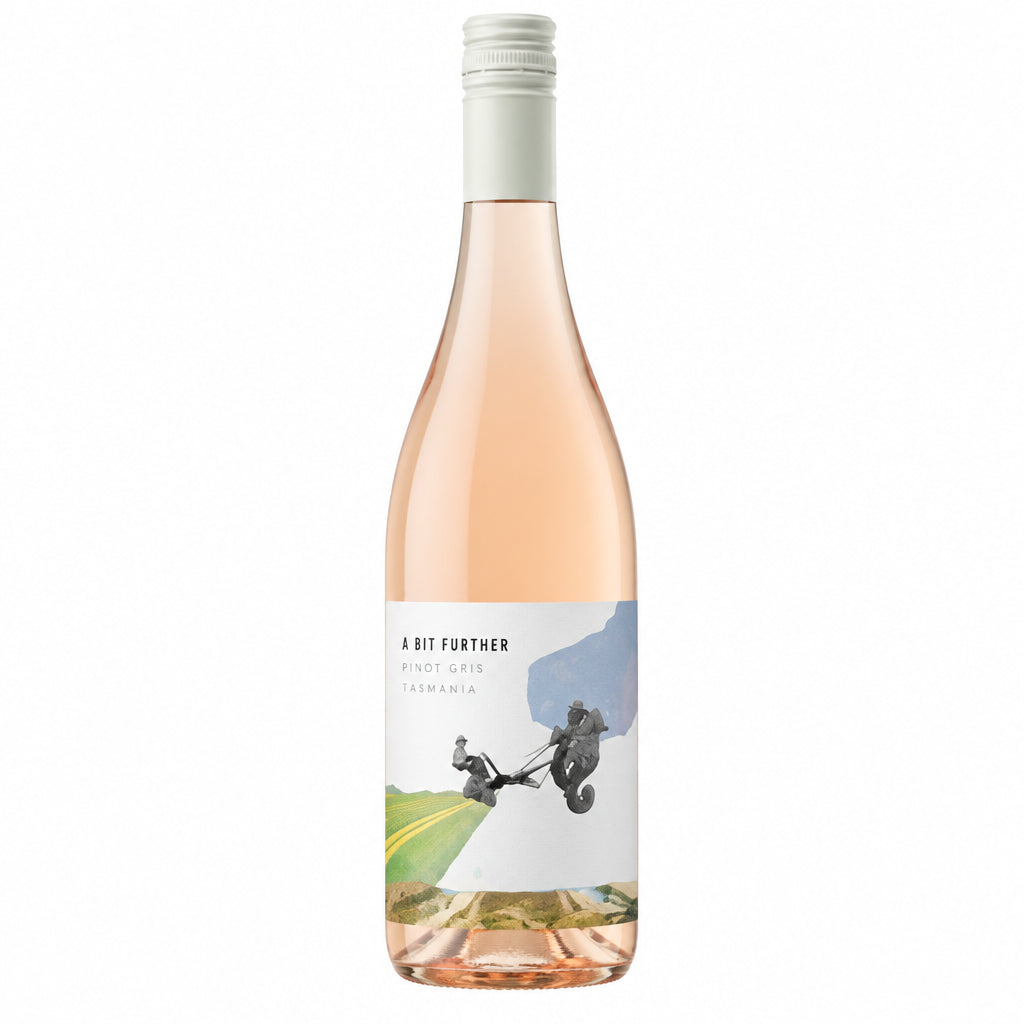 A bottle of La Nuit D'etang Blanc wine with a white label, placed on a wooden surface with a blurred background.