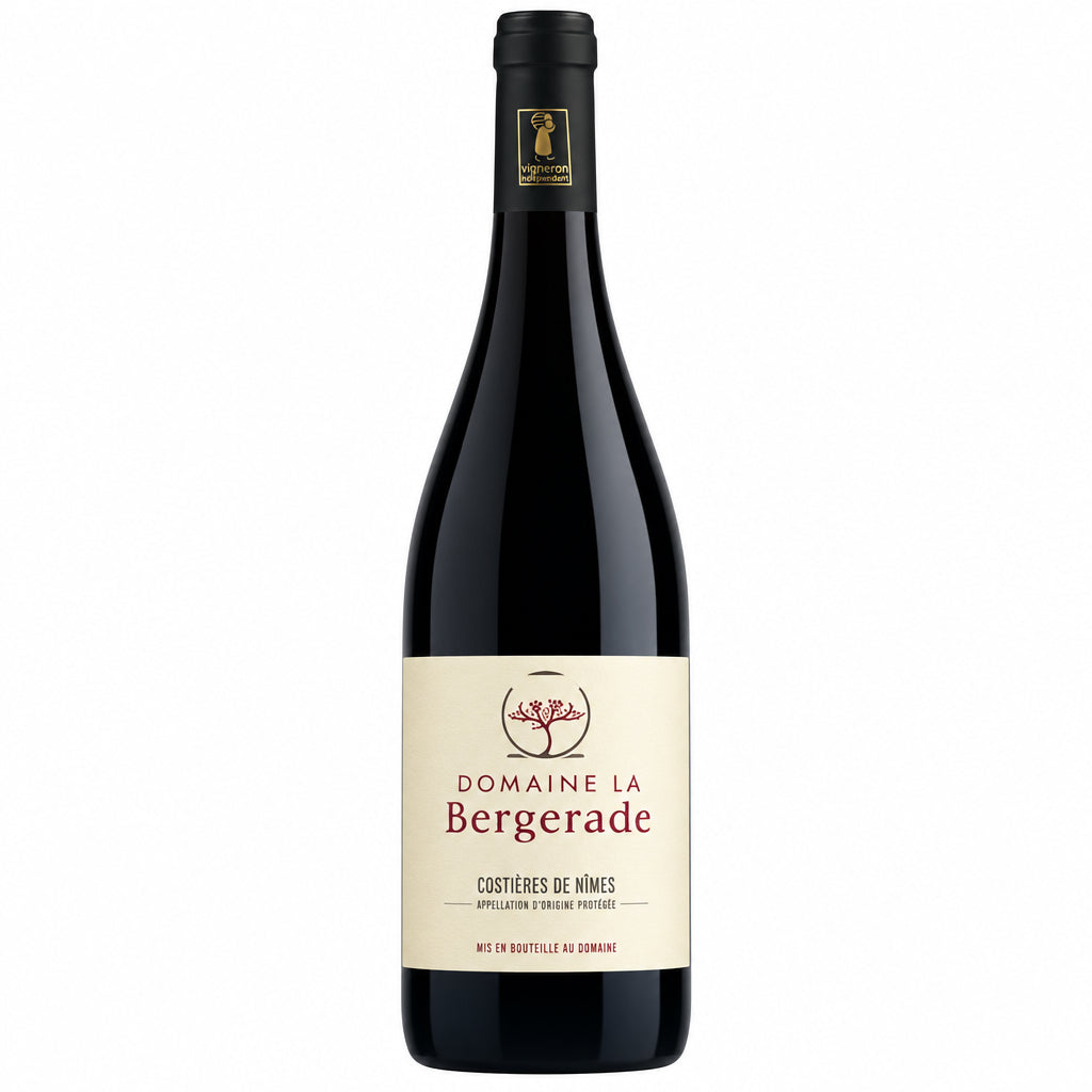 Bottle of Domaine de la Bergerade Rouge red wine from Domaine, showing the label and deep red color in the glass