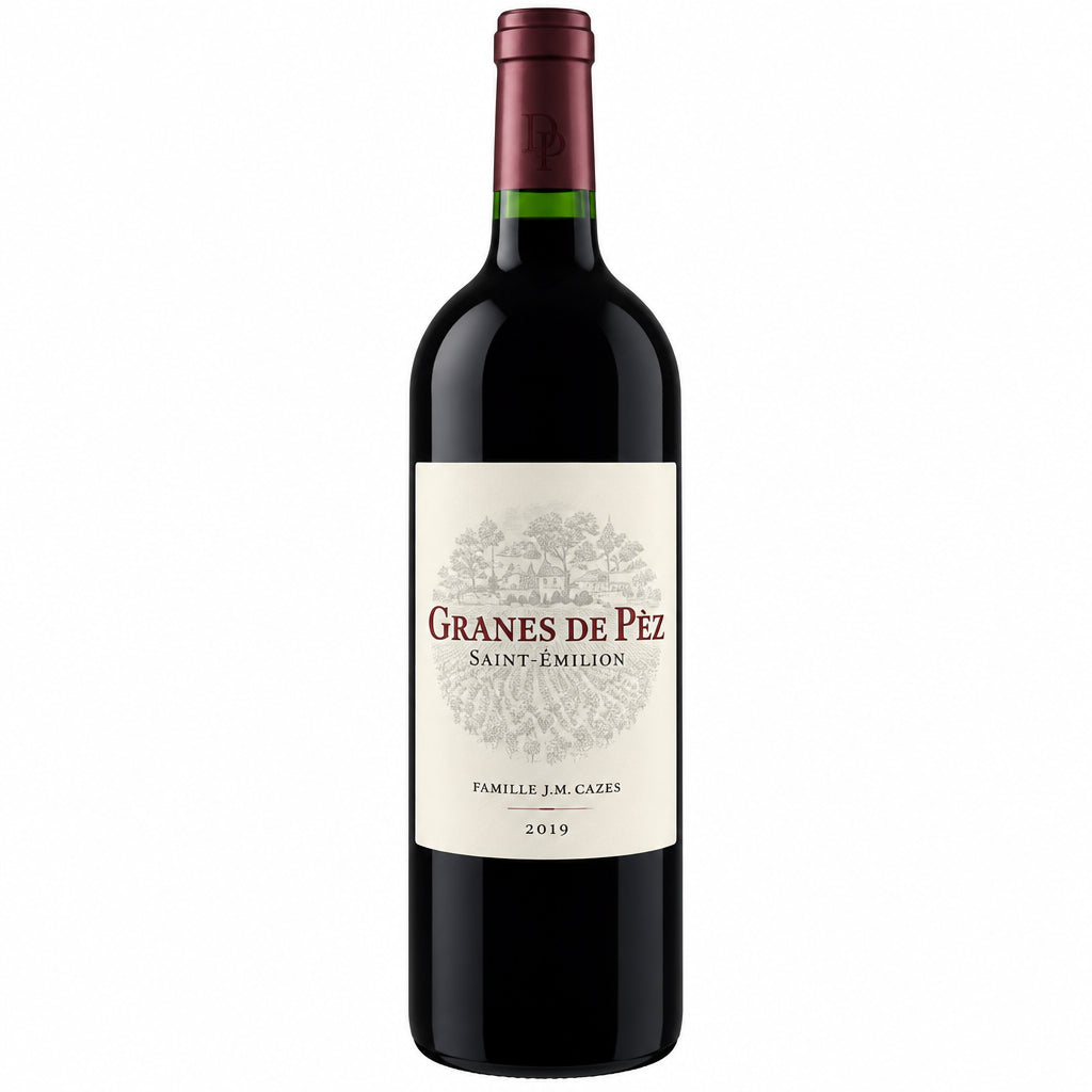 Bottle of Chateau Les Ormes De Pez red wine with a label showing the Chateau brand and classic red and gold design.