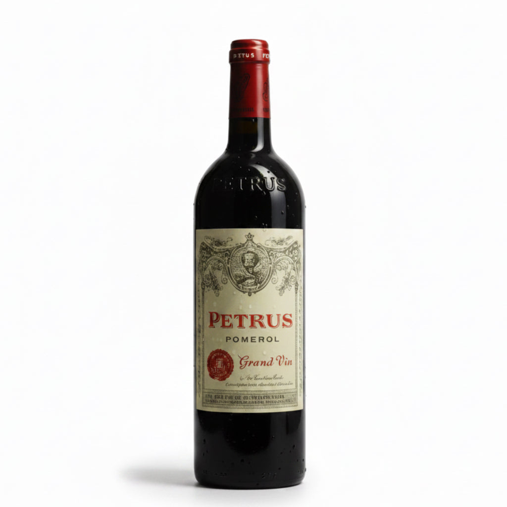 Bottle of Petrus 2021 red wine in a glass with a dark label, showcasing the elegant wine bottle on a neutral background.