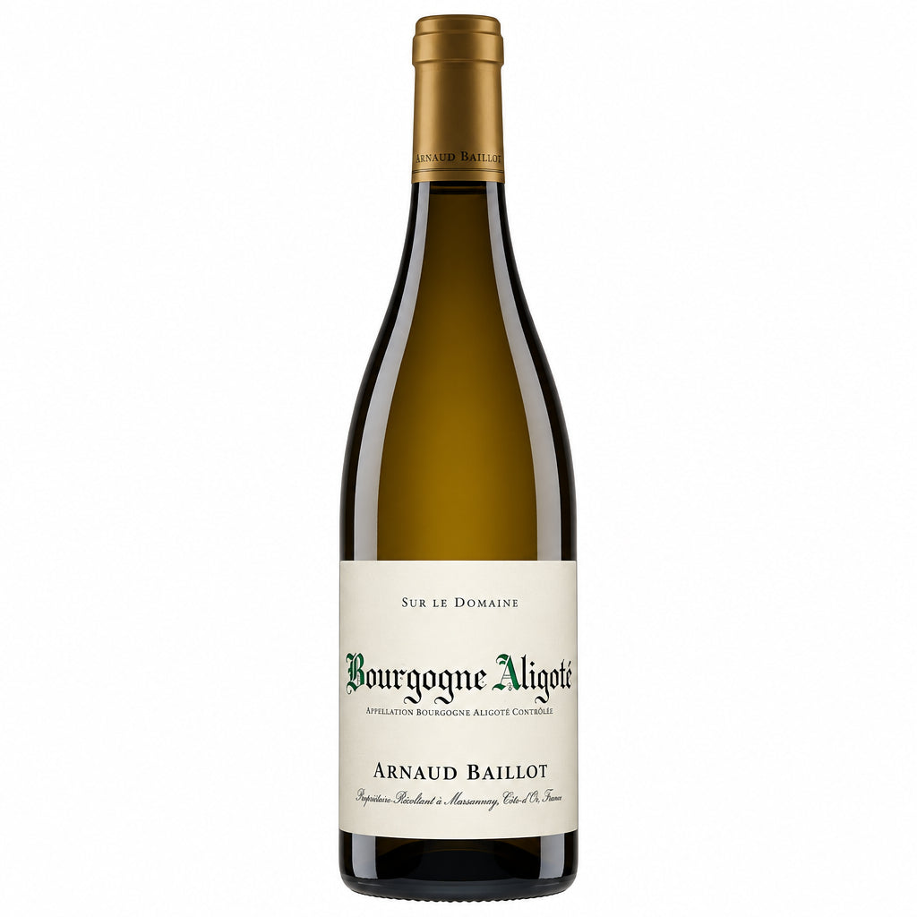 Bourgogne Aligote white wine from Domaine Arnaud Baillot in a clear wine glass on a neutral background.