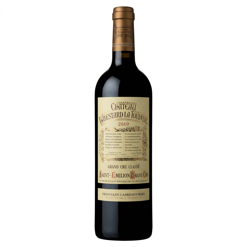 Bottle of Chateau Balestard La Tonnelle 2009 red wine with a dark label and foil capsule, positioned upright against a neutral background.