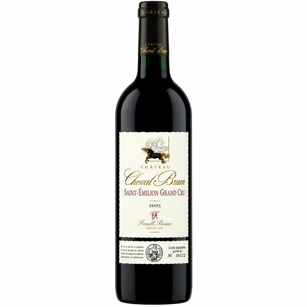 Famille Riviere Chateau Cheval Brun St Emilion Grand Cru wine bottle with label visible, placed on a wooden surface.