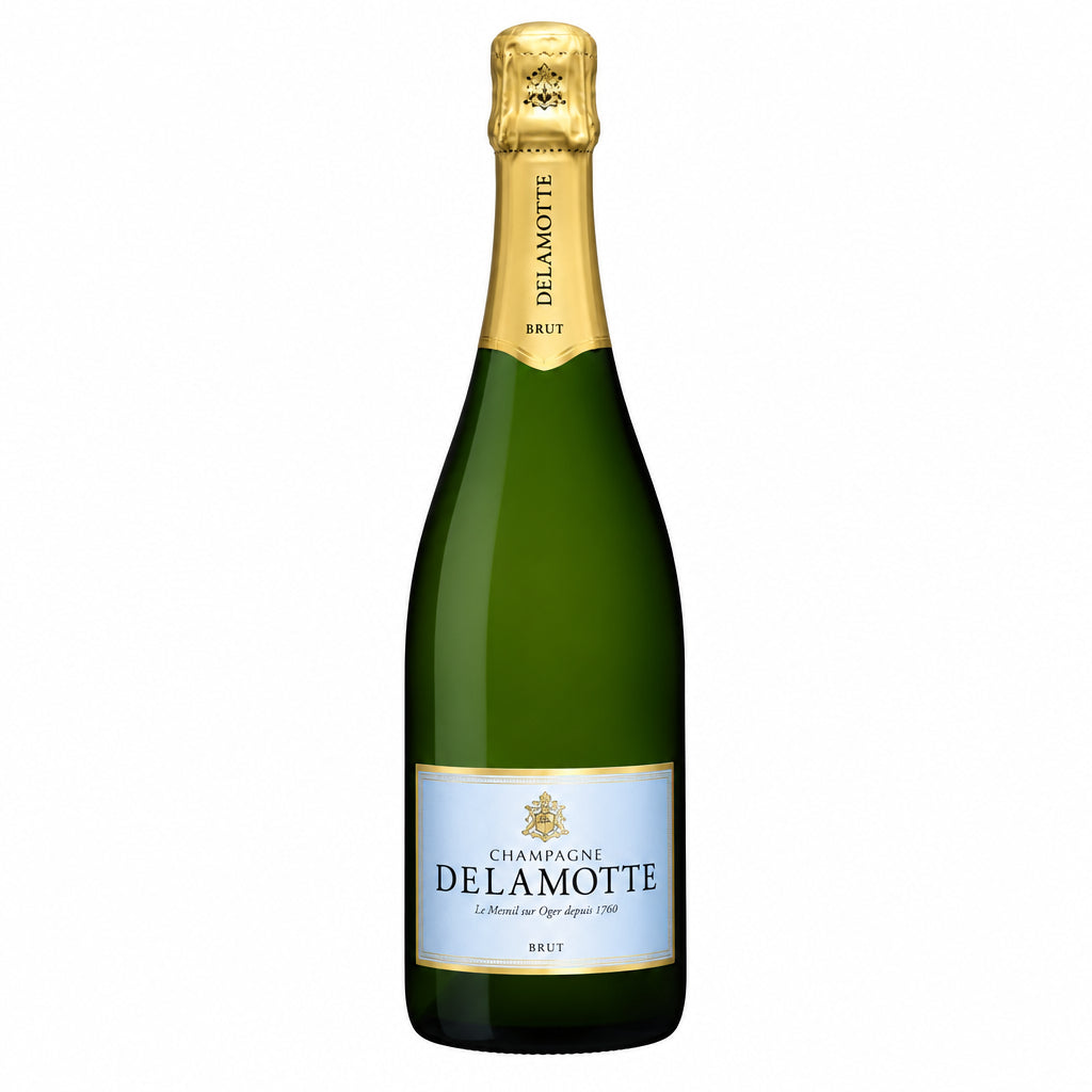 Champagne Delamotte Brut bottle with elegant label and foil wrapping, ready for celebration.