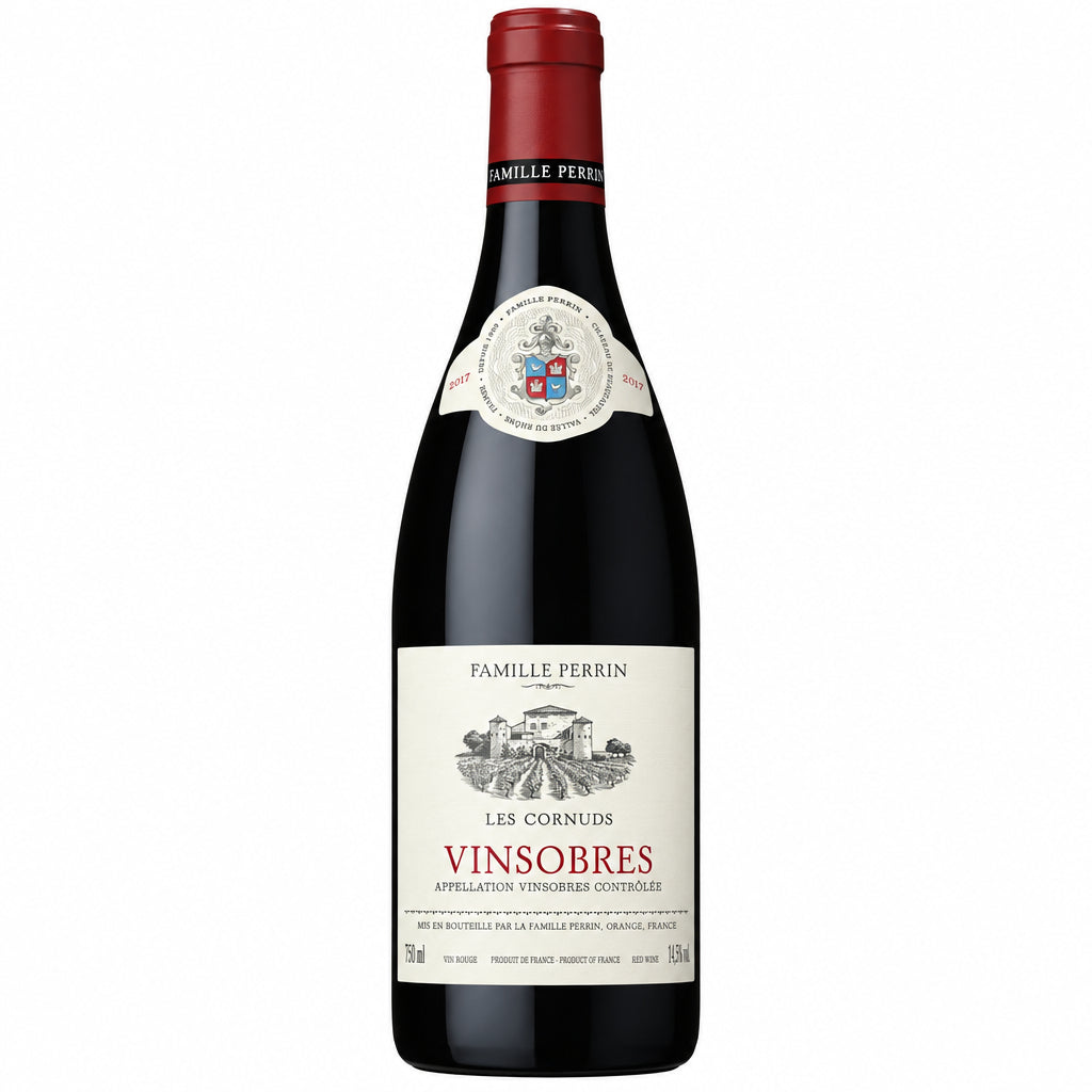 Family Perrin Vinsobres Les Cornuds wine bottle with label showing red and gold design on a wooden surface.