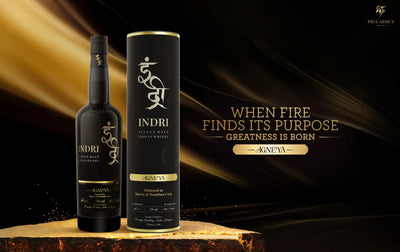 Bottle of Indri Agneya single malt Indian whisky with label visible, 750mL size, in a clear glass bottle.
