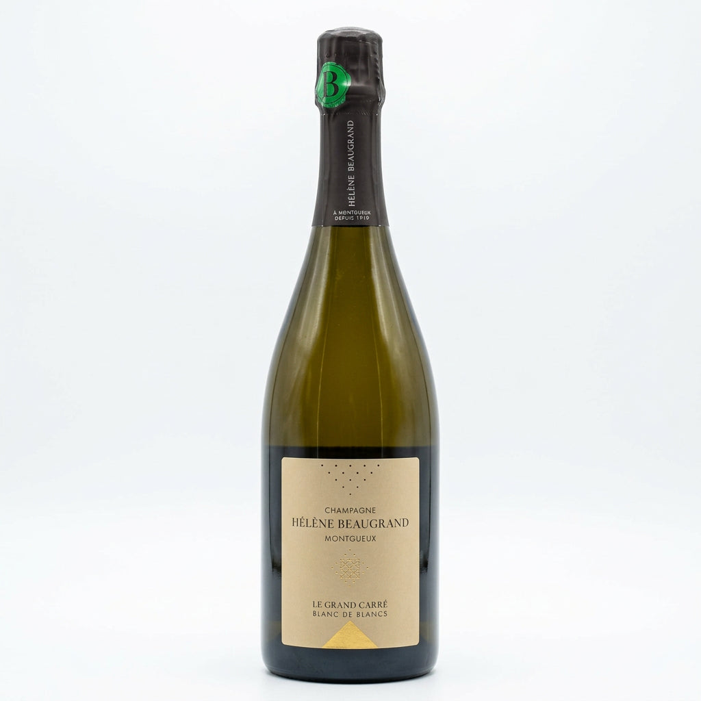 Bottle of Champagne Helene Beaugrand Le Grand Carre Extra Brut Blanc de Blancs, elegant champagne with a gold foil label.