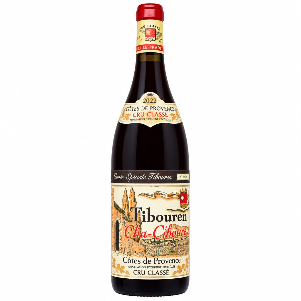 Close-up of Clos Tibouren Tradition Rouge wine bottle with a dark red label, showcasing the elegant packaging and branding.