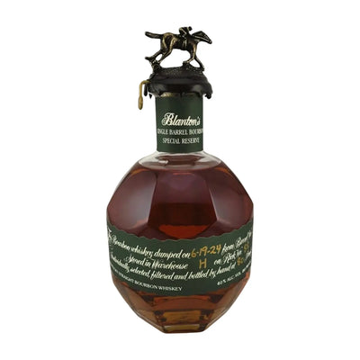 Bottle of Blanton's Special Reserve bourbon whiskey in a 750mL bottle with a distinctive label and decorative cap.