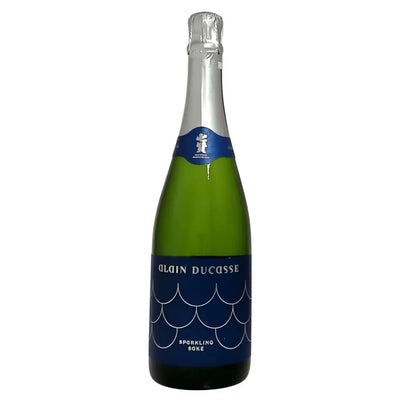 Bottle of Alain Ducasse Sparkling Sake by Yamanashi Meijo, 720mL, with a sleek label and clear glass showcasing the sparkling beverage inside.