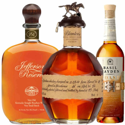 Bottle of Blanton's Original bourbon whiskey in a family bucket, featuring three 750mL bottles with blue and gold label details.