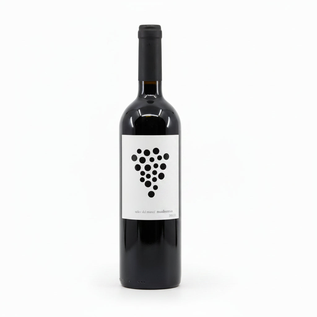 Celler Del Roure Maduresa 750mL wine bottle with a dark label and traditional cork, displayed on a wooden table.