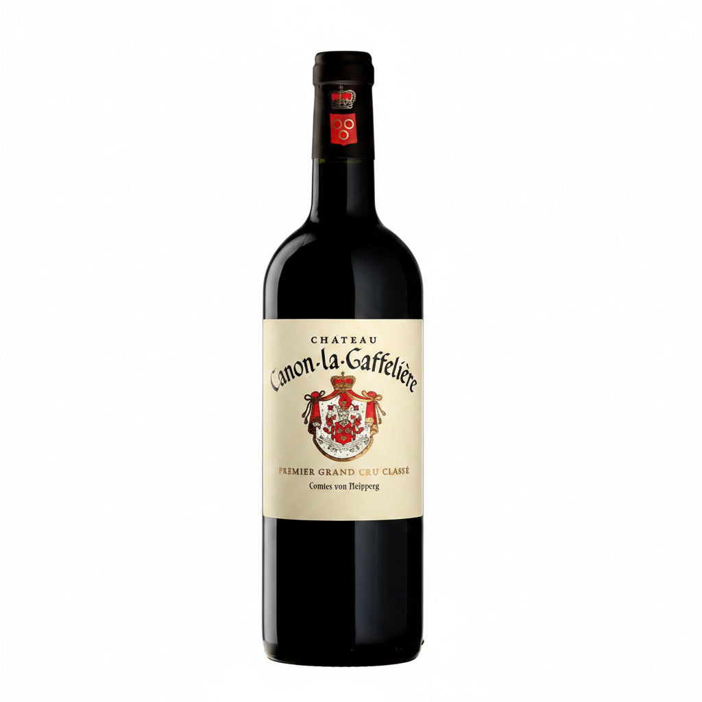 Bottle of Chateau Canon La Gaffeliere red wine with label visible, showcasing a rich, deep color in a clear glass bottle.
