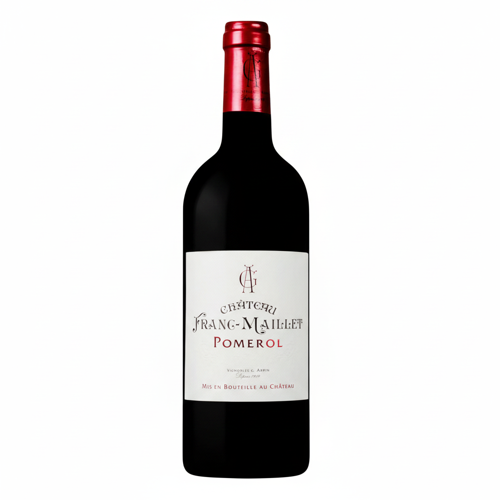 Bottle of Chateau Franc-Maillet Pomerol red wine featuring the label and glass with poured wine on a wooden table.