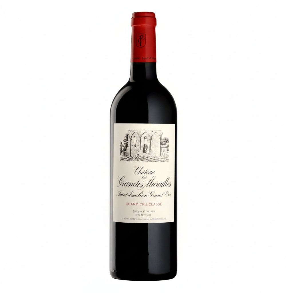 Chateau Grandes Murailles wine bottle from Chateau with a dark label, standing upright on a wooden surface.
