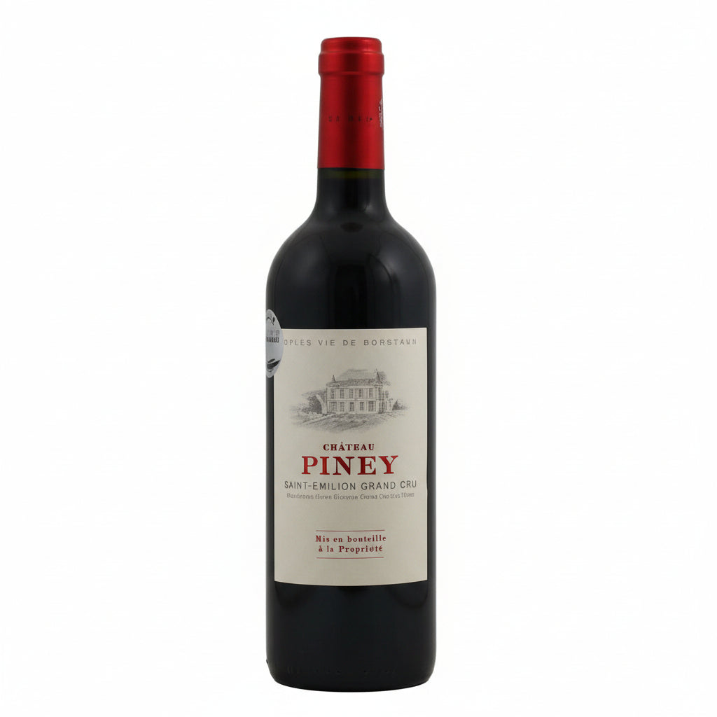 Chateau Piney Saint Emilion Grand Cru wine bottle with label visible, showcasing a red wine from Bordeaux, France.