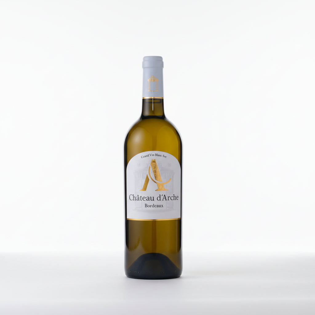 Chateau d'Arche A Blanc Sec white wine in a clear glass bottle with a gold foil top, featuring a white label with elegant gold accents.