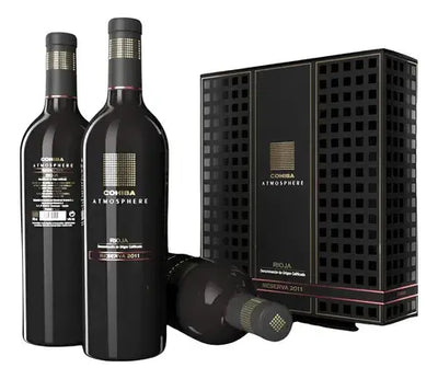 Cohiba Atmosphere Reserva Rioja DOC wine bottles, 3-pack, with elegant labels and deep red and gold design on the bottles.