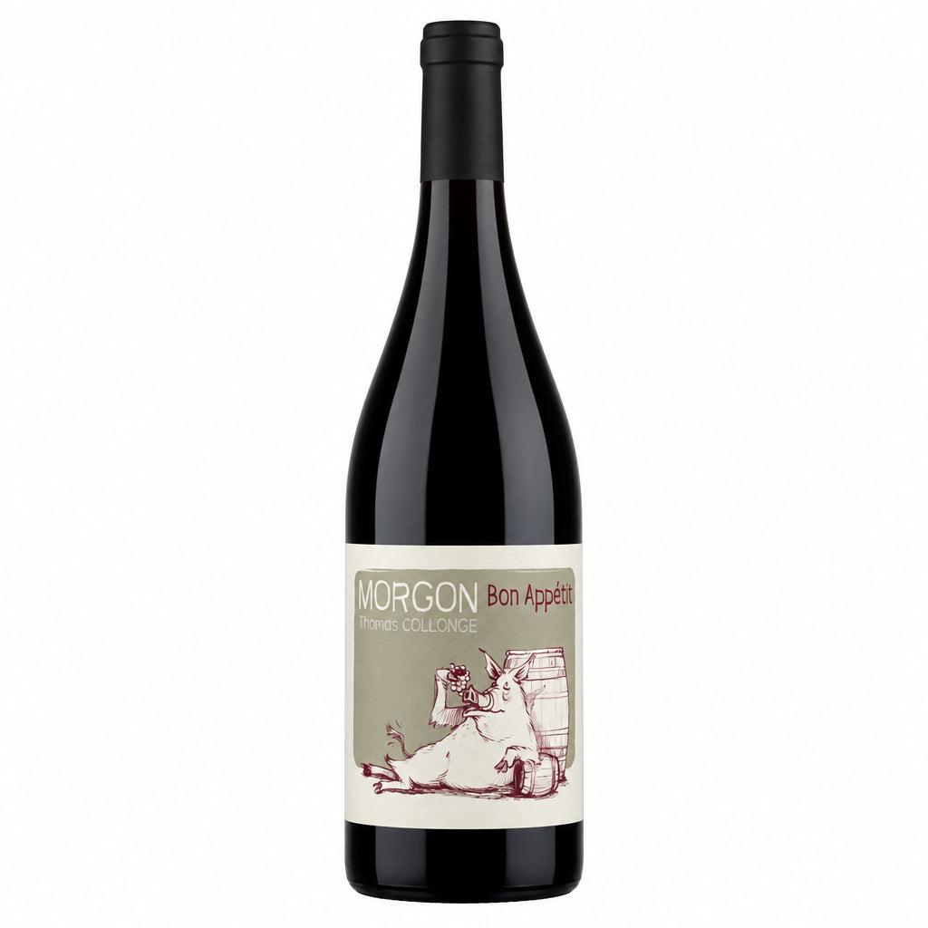 Domaine de Colonat Morgon Bon Appetit wine bottle with label and glass of red wine on a table.