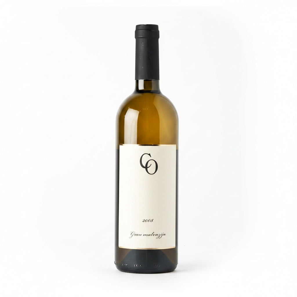 Bottle of Coronica Gran Malvasia wine, 750mL, with a white label and gold accents, displayed on a wooden surface.