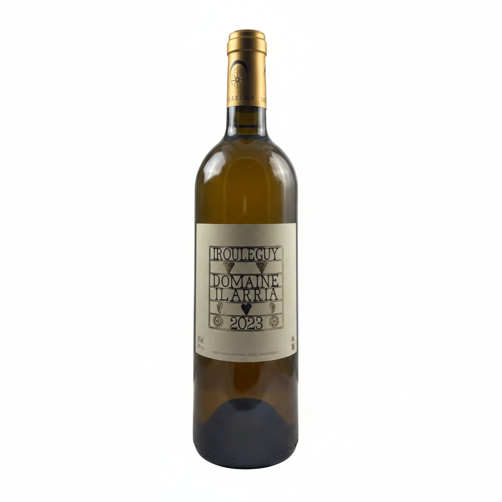 A bottle of Domaine Ilarria Irouleguy Blanc white wine with a label featuring the Domaine logo and a wine glass beside it.