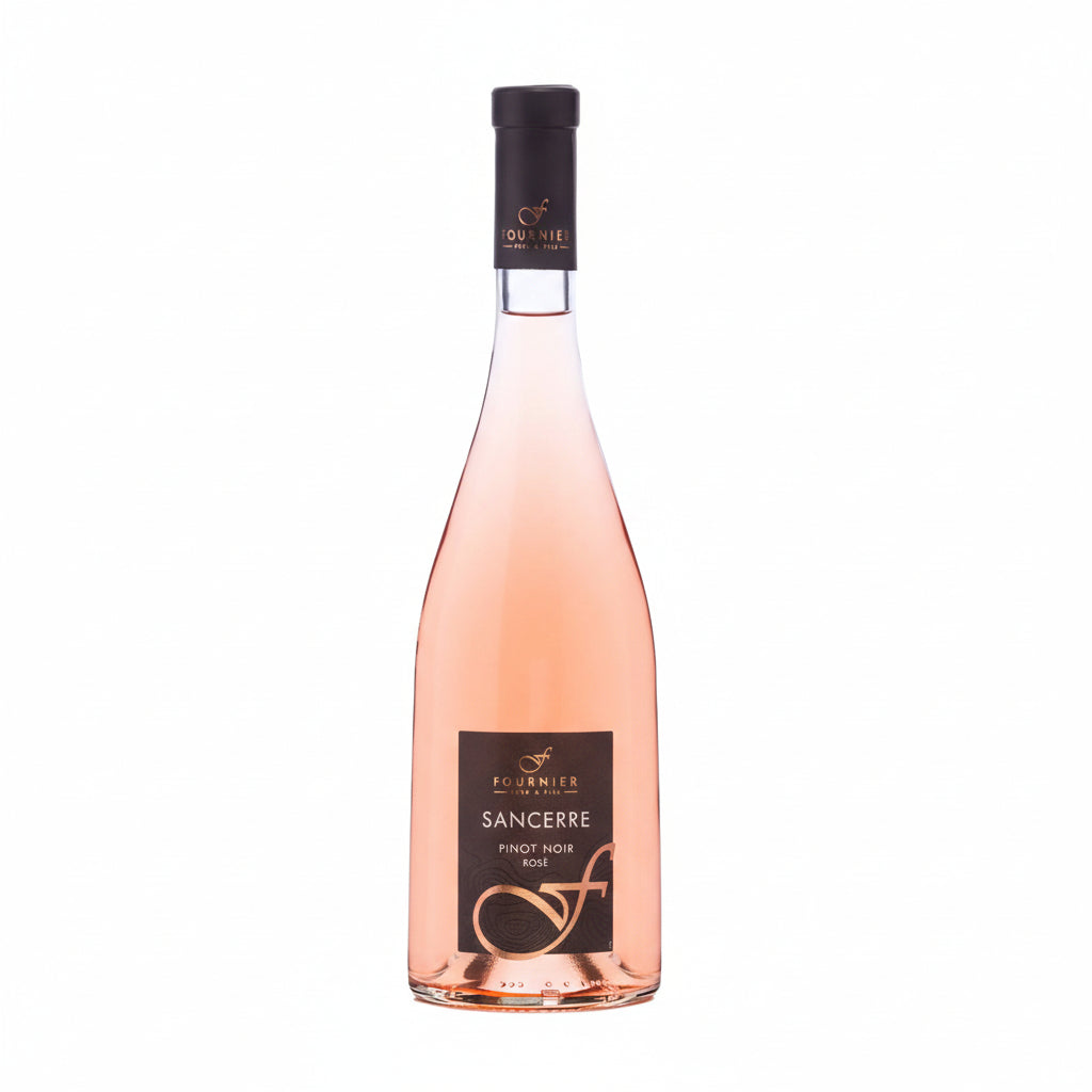 Fournier De Fournier Pinot Noir Rosé bottle with a pinkish hue and elegant label, set on a rustic wooden surface.