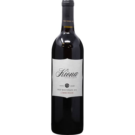 Bottle of Kiona Red Mountain Lemberger wine in a 750mL bottle with a label featuring the Kiona brand and red mountain scenery.