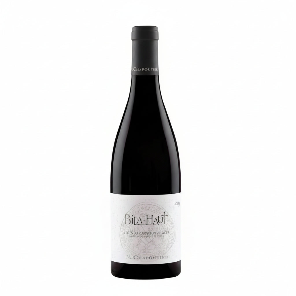 Bottle of M. Chapoutier Cotes-du-Roussillon-Villages Les Vignes de Bila-Haut Rouge wine, with a dark glass bottle and label.