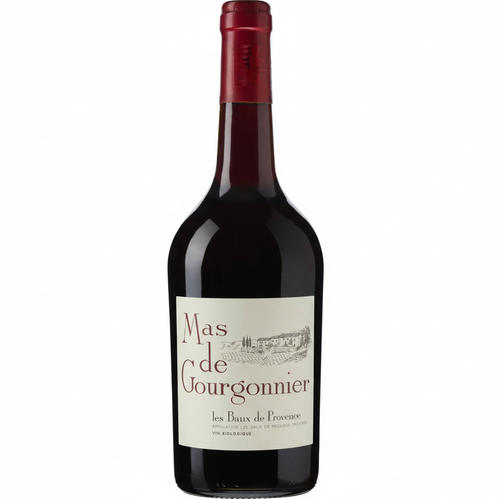 Bottle of Mas de Gourgonnier Les Beaux de Provence wine with label visible, showcasing a red wine from Provence region in France.