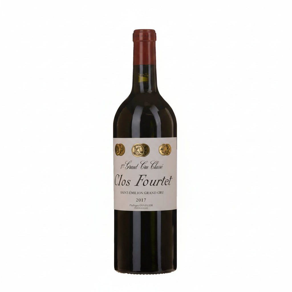 Bottle of Philippe Cuvelier Clos Fourtet Saint-Emilion 1er Grand Cru Classe red wine with a detailed label and dark glass.