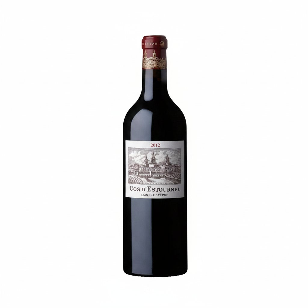 Elegant bottle of Chateau Cos D'Estournel Bordeaux wine with a distinctive label and deep red color, standing on a wooden surface.