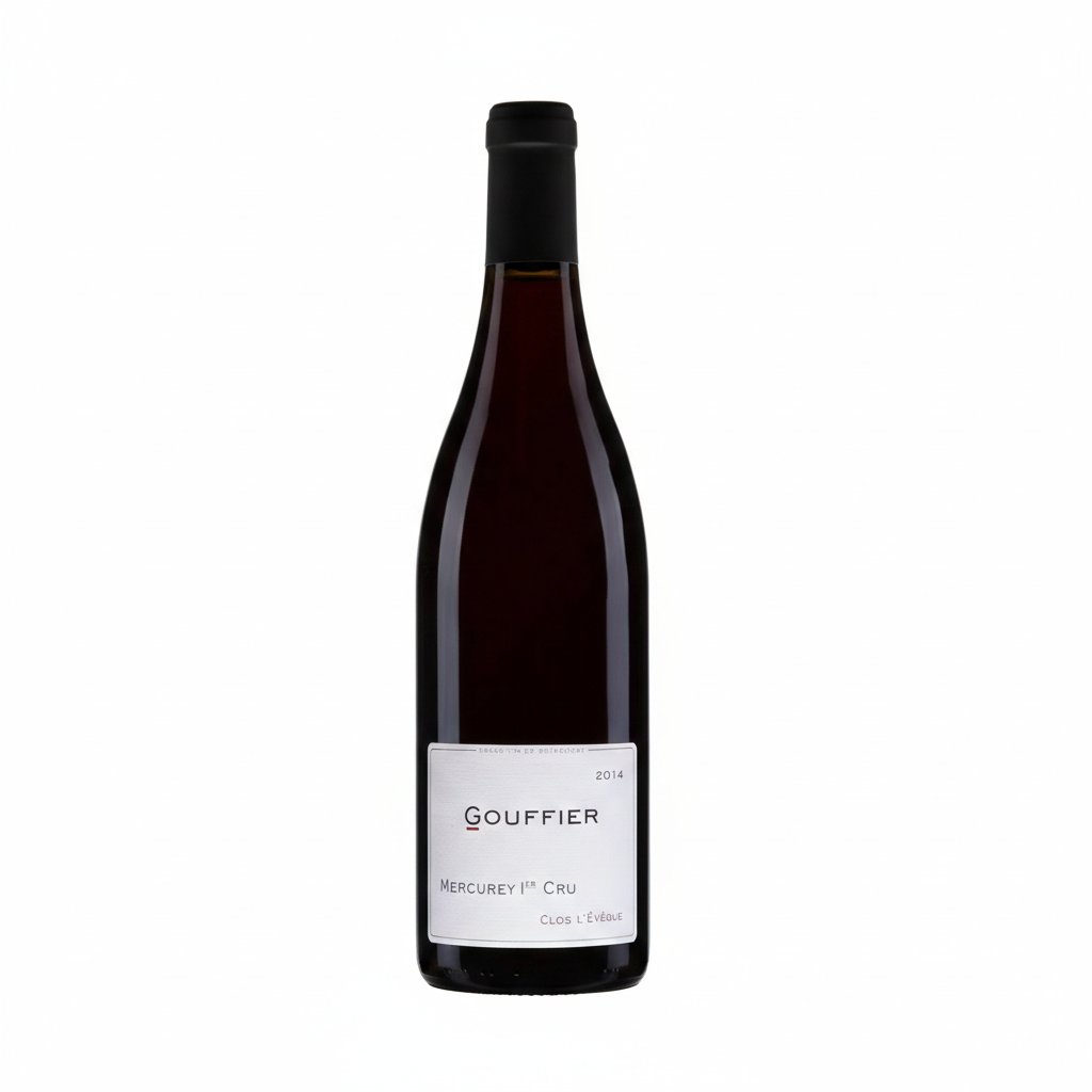 Bottle of Domaine Gouffier Mercurey 1er Cru Clos L'Eveque wine on a wooden surface with a blurred vineyard background.