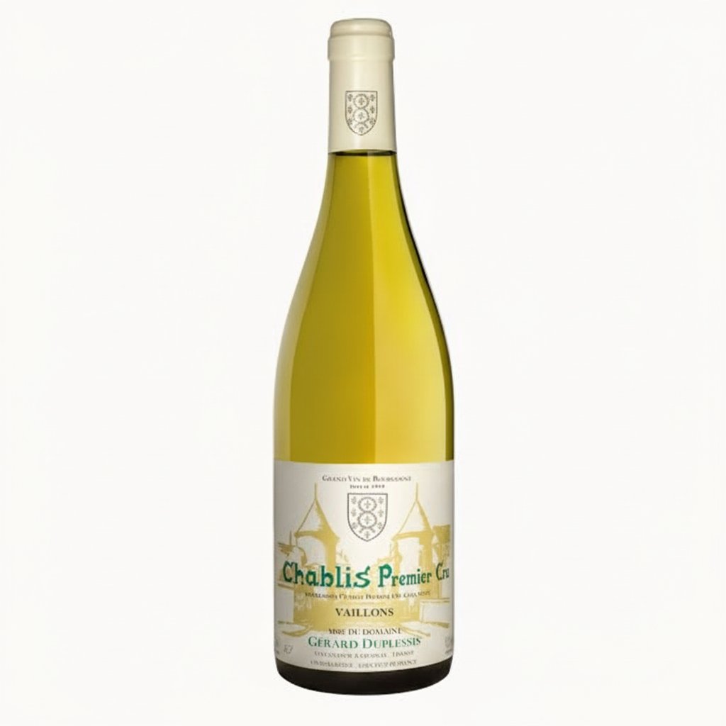 Bottle of Duplessis Chablis 1er Vaillons wine with a clear glass showcasing golden liquid and a vineyard background.