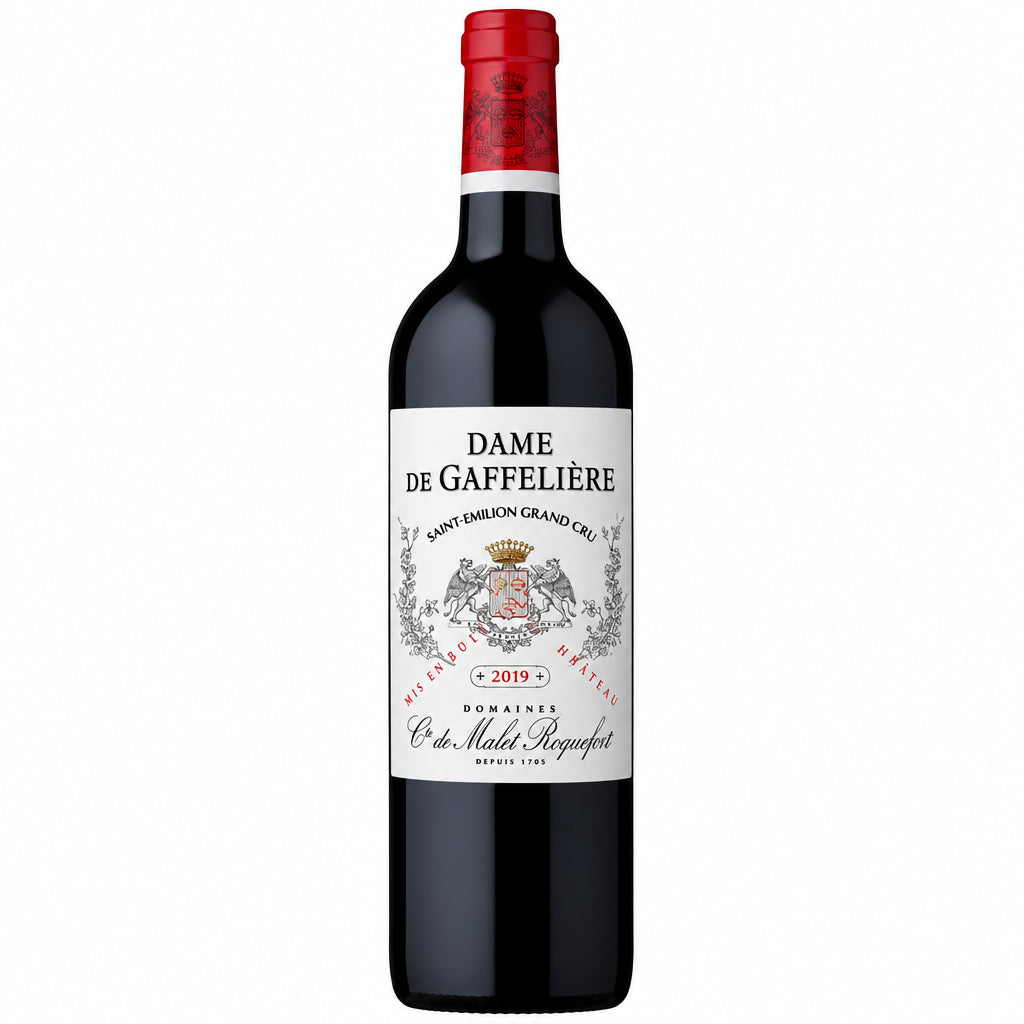 Bottle of Chateau La Gaffeliere Dame de Gaffeliere 2019 red wine with label visible, placed on a wine cellar shelf.