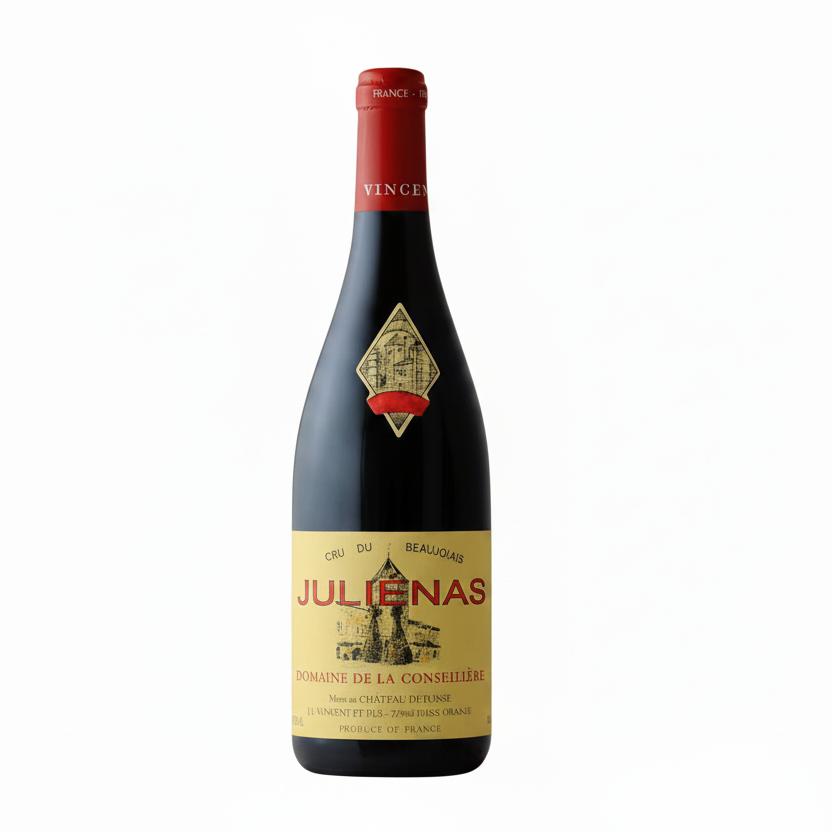 Chateau Fuisse Julienas Domaine De La Conseillere wine bottle with label and glass of red wine on a table.
