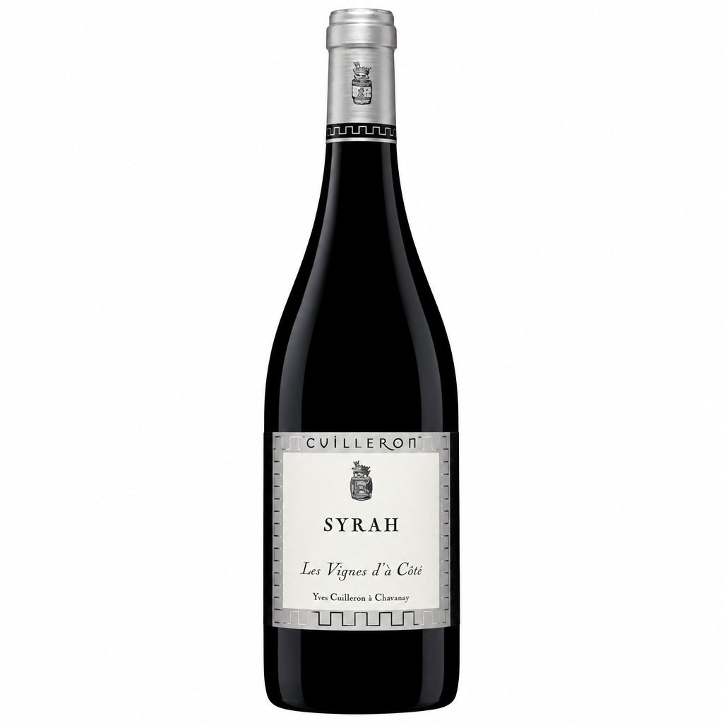 Yves Cuilleron VDP Syrah wine bottle with dark glass and label, placed on a wooden surface.