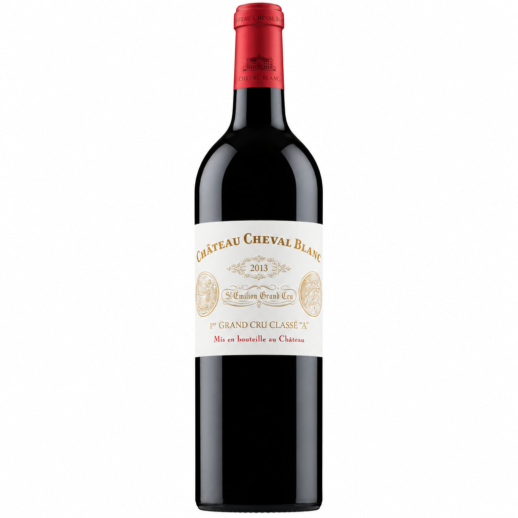 Bottle of Chateau Cheval Blanc 2013 Bordeaux red wine with a classic label and elegant glass presentation.