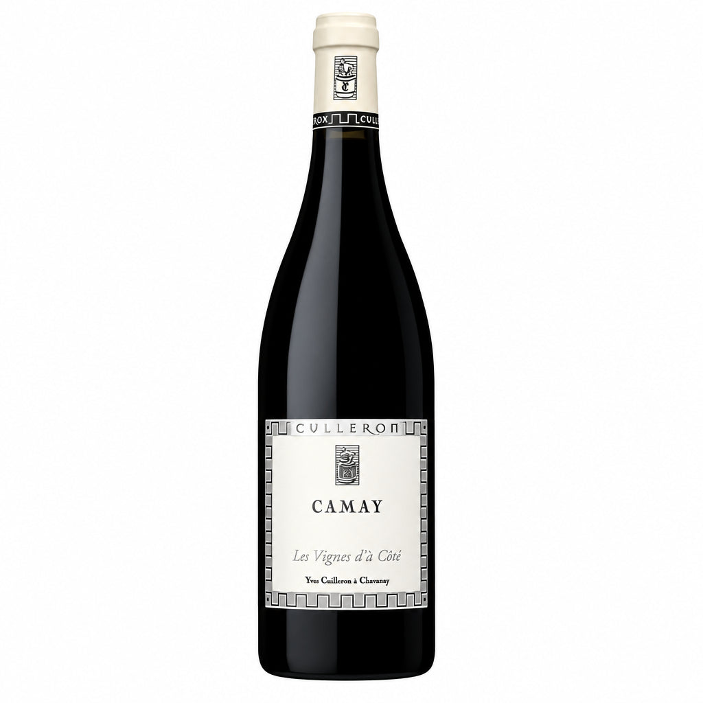 Yves Cuilleron Les Vignes d'a Cote Gamay wine bottle with label and glass of red wine in front, showcasing the product's packaging.