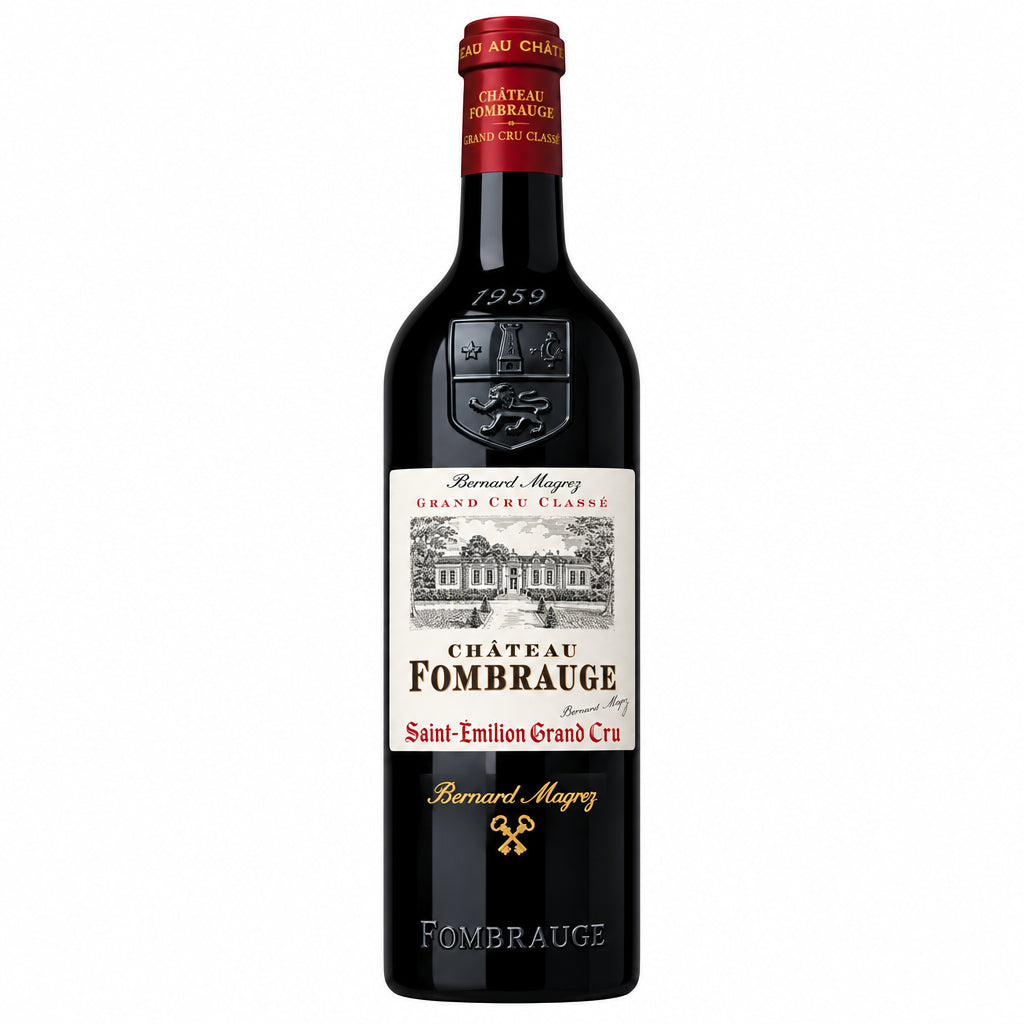 Bottle of Chateau Fombrauge red wine with a dark label, sitting on a wooden surface against a neutral background.