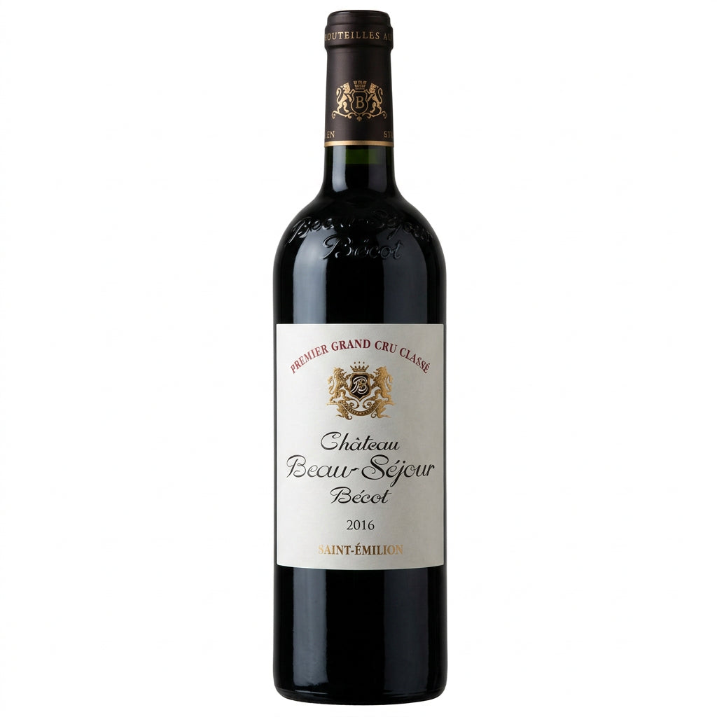 Chateau Beau-Sejour Becot 2021 Bordeaux red wine bottle on a wooden surface with a vineyard background.