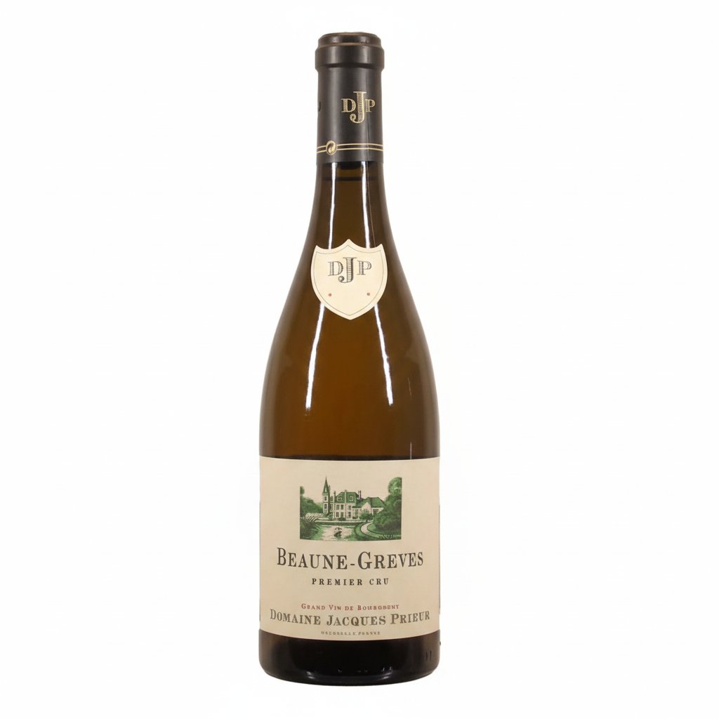 Prieur Beaune Grèves 1er Cru Blanc wine bottle with label and glass of white wine in the background.
