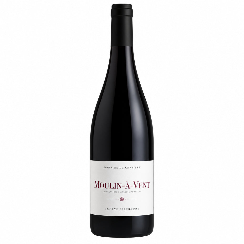 Domaine Domaine de Colonat Moulin A Vent Vieilles Vignes red wine bottle on a wooden surface with a blurred background.