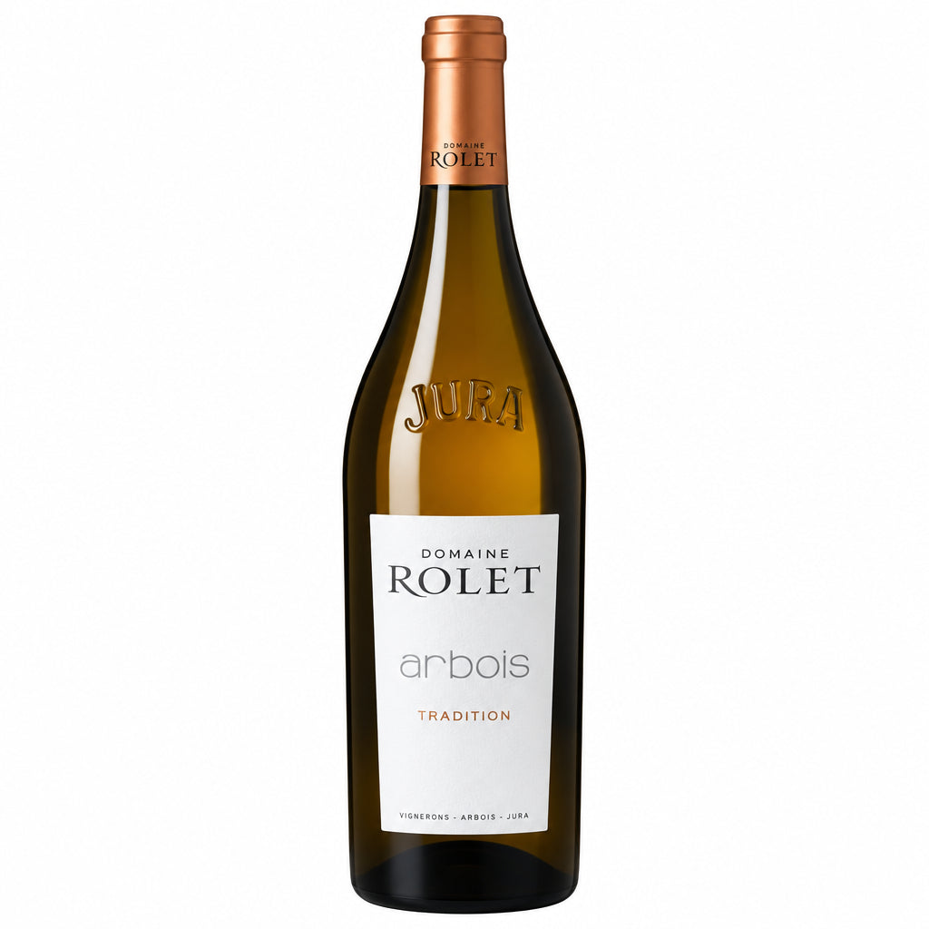 Domaine Rolet Arbois Tradition wine bottle with label, showcasing traditional French wine from Jura region.